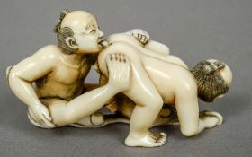 A Japanese ivory netsuke
Carved as two figures performing a homo-erotic act, the underside signed.