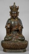 A large painted bronze model of Buddha
Typically modelled seated in the lotus position.  44 cm high.