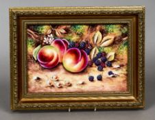 A Royal Worcester porcelain plaque by Terrance Knutt
Painted with fruit, housed in gilt frame.