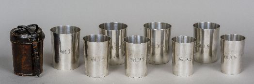 A set of eight leather cased silver plated hunting beakers
Each of graduated conical form,