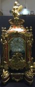 A large boulle bracket clock With bracket, the domed top surmounted a female warrior,