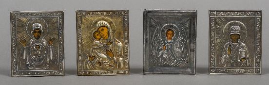 Four small Russian silver clad icons Each of typical religious form, each marked for 84 Zolotniks.