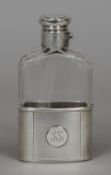 An Edward VII silver mounted facet cut glass hip flask, the collar hallmarked London 1905,