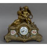 A 19th century Sevres type porcelain panel mounted ormolu mantel clock The top with putto and a
