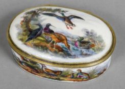 An 18th/19th century Continental gilt metal mounted porcelain snuff box Of oval section,