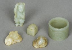 A small Chinese carved jade figure Together with four other various jade pieces. The former 6.