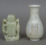 A Chinese mutton fat jade vase Of ovoid form, with calligraphic decoration,