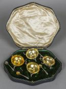 A cased set of Edwardian silver and silver gilt lined salts, each hallmarked for London 1907,