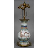 A 19th century Chinese porcelain vase Decorated in the round with a dragon chasing a flaming pearl,