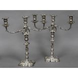 A pair of George II style silver plated twin branch candelabra by Creswick & Co.