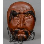 A large late 19th century Japanese lacquered mask of Noh Of typical form,