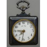 A square gun metal cased alarm pocket watch Of large proportions,
