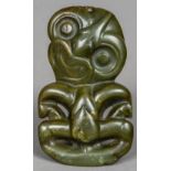 A 19th century Maori Hei Tiki pendant Of typical form. 12 cm high.