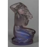 A Lalique amethyst glass model of a nude woman Together with a Lalique green glass model of a