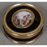 A matched pair of 18th century Continental unmarked gold mounted porcelain inset and enamel