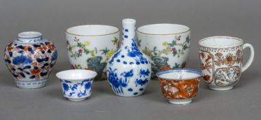 A small collection of Chinese porcelain items Including: an 18th century cup.