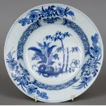 A Chinese blue and white porcelain dish Decorated with floral sprays, possibly Kangxi.