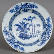 A Chinese blue and white porcelain dish Decorated with floral sprays, possibly Kangxi.