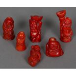 Six various carved Chinese coral figures The largest 7 cm high.