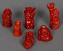 Six various carved Chinese coral figures The largest 7 cm high.