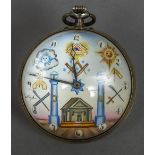 A Swiss ball clock Of typical form, the dial with Arabic numerals and Masonic motifs. 6.5 cm wide.