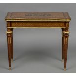 A 19th century parquetry inlaid concertina action card table The ormolu mounted shaped top