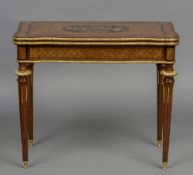 A 19th century parquetry inlaid concertina action card table The ormolu mounted shaped top