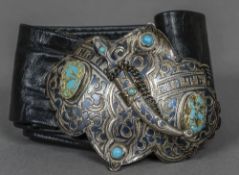 A Russian niello decorated silver buckle With central dagger form fastener and turquoise cabochons,