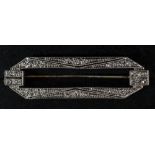 An 18 ct white gold and platinum diamond set Art Deco brooch 4.25 cm wide.