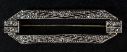 An 18 ct white gold and platinum diamond set Art Deco brooch 4.25 cm wide.