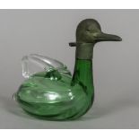 A small green glass claret jug Formed as a duck. 18 cm wide.