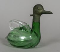 A small green glass claret jug Formed as a duck. 18 cm wide.