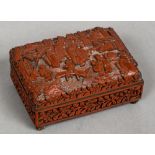 A small late 19th century Chinese cinnabar lacquered box The domed removable cover decorated with