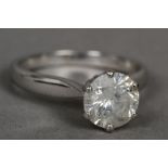 An 18 ct white gold diamond set solitaire ring The claw set stone approximately 2 carats.