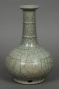 A Chinese porcelain Ge type bottle vase Overall creamy grey glaze suffused with a matrix of dark