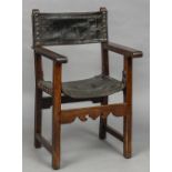 An 18th century Spanish walnut Armada chair Of typical form,