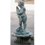 A patinated bronze garden fountain Formed as a putto holding a fish, a turtle at this feet,