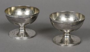 A pair of George III silver table salts, hallmarked London 1790,