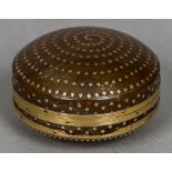 An 18th/19th century gold mounted and pique decorated blond tortoiseshell box and cover Of circular