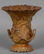 A large 19th century brown salt glaze vase Of crimped flared form,