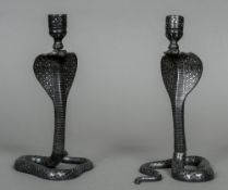 A pair of 19th century Bidriware candlesticks Each formed as a cobra. Each 23 cm high.
