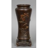 A fine quality Japanese Meiji period yellow metal inlaid patinated bronze vase Of waisted