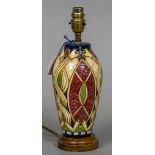 A modern Moorcroft pottery table lamp With stylised Arts & Crafts decoration. 31 cm high.