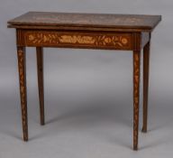 An 18th/19th century Dutch marquetry card table The hinged rotating rectangular top decorated with