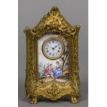 A Swiss enamel decorated desk clock The ormolu case of vitrine form,