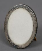 A small Tiffany & Co. Sterling silver photograph frame Of plain oval form. 9.5 cm high.