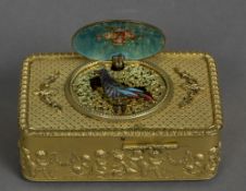 A 19th century Continental ormolu cased musical bird box The hinged cover set with a pastoral scene