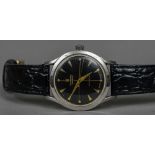 A Universal Stainless steel cased automatic gentleman's wristwatch The black signed dial with baton