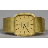 An 18 ct gold Omega Constellation gentleman's wristwatch The square dial set with batons. 3.