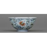 A Chinese porcelain wine cup With shaped rim and decorated with lotus strapwork,